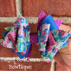 Bright Leopard Faux Leather Glitter Pinwheel’s Hair Bow